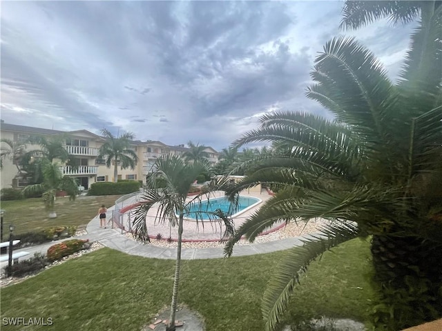 3706 Broadway Unit 27, Fort Myers, FL 33901 - outdoor pool with a yard