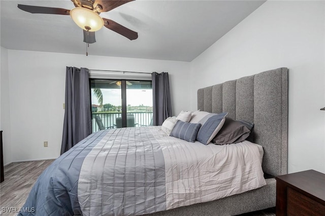 11140 Caravel Cir Unit 306, Fort Myers, FL 33908 - bedroom featuring wood finished floors, access to outside, and ceiling fan