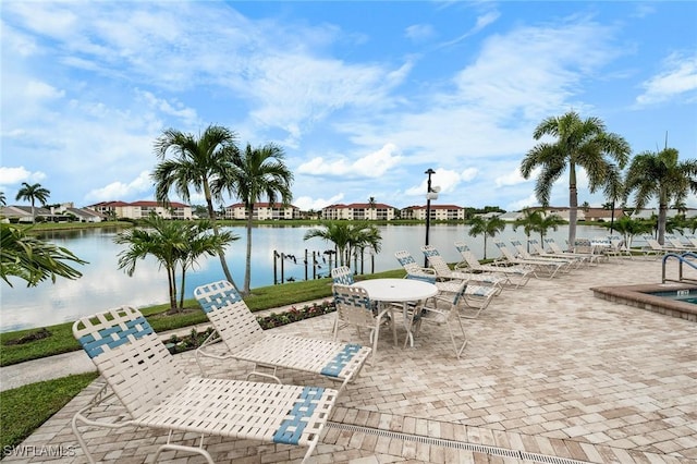 11140 Caravel Cir Unit 306, Fort Myers, FL 33908 - view of patio with a water view