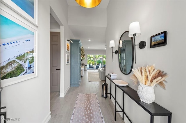10581 Woodchuck Ln, Bonita Springs, FL 34135 - hallway featuring recessed lighting and light wood-style floors