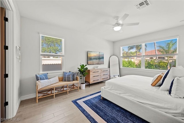 10581 Woodchuck Ln, Bonita Springs, FL 34135 - bedroom with light wood-style flooring and a ceiling fan
