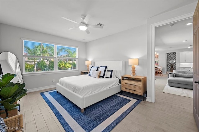 10581 Woodchuck Ln, Bonita Springs, FL 34135 - bedroom with light wood-style floors, ceiling fan, and recessed lighting