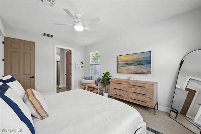 10581 Woodchuck Ln, Bonita Springs, FL 34135 - bedroom featuring a ceiling fan and connected bathroom