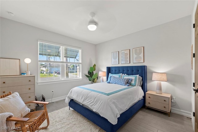 10581 Woodchuck Ln, Bonita Springs, FL 34135 - bedroom featuring wood finished floors and ceiling fan