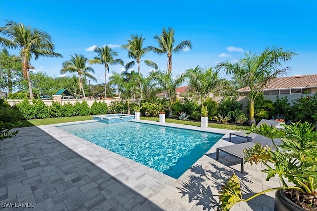 10581 Woodchuck Ln, Bonita Springs, FL 34135 - view of pool featuring a pool with connected hot tub and a patio area