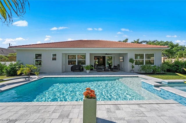 10581 Woodchuck Ln, Bonita Springs, FL 34135 - outdoor pool with a ceiling fan, a patio, and an in-ground hot tub