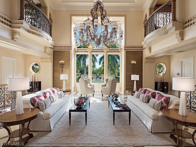 5051 Pelican Colony Blvd Unit 401, Bonita Springs, FL 34134 - living area with a high ceiling, a chandelier, and crown molding