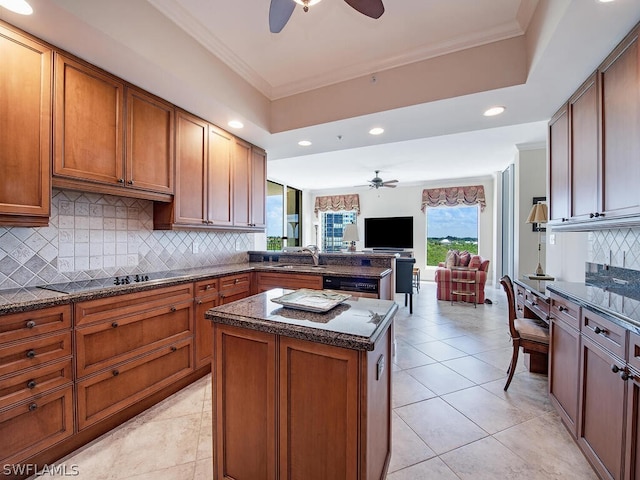 5051 Pelican Colony Blvd Unit 401, Bonita Springs, FL 34134 - kitchen with a ceiling fan, ornamental molding, decorative backsplash, dark stone counters, and recessed lighting