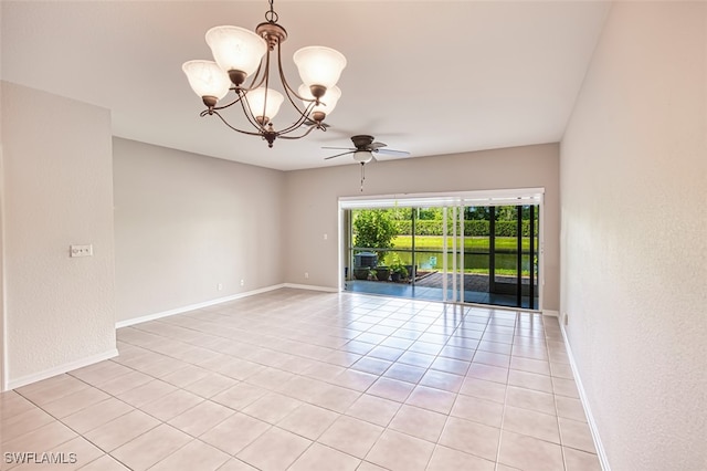 10058 Pacific Pines Ave, Fort Myers, FL 33966 - spare room featuring a ceiling fan, a chandelier, light tile patterned floors, and a textured wall