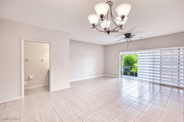 10058 Pacific Pines Ave, Fort Myers, FL 33966 - empty room featuring a chandelier, a ceiling fan, and light tile patterned floors