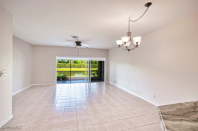 10058 Pacific Pines Ave, Fort Myers, FL 33966 - empty room featuring light tile patterned floors, ceiling fan, a chandelier, and a textured wall