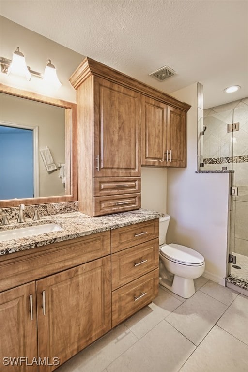 10058 Pacific Pines Ave, Fort Myers, FL 33966 - bathroom featuring vanity, a stall shower, and tile patterned flooring
