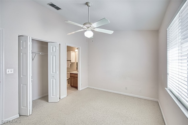 10058 Pacific Pines Ave, Fort Myers, FL 33966 - unfurnished bedroom with a closet, a ceiling fan, and ensuite bathroom