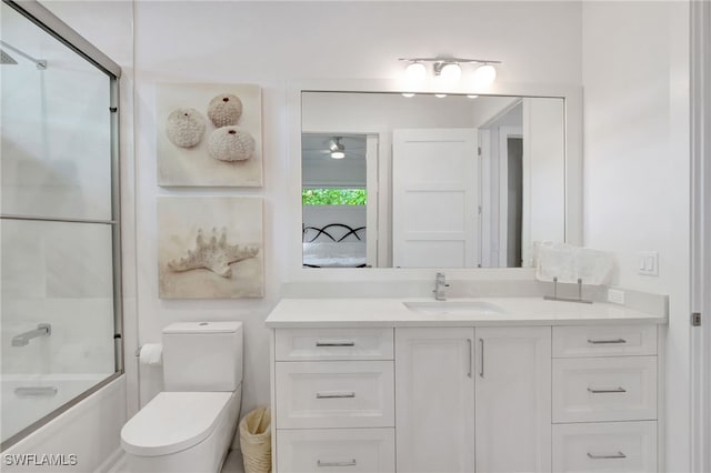 2120 Curtis St, Naples, FL 34112 - bathroom featuring vanity, shower / bath combination with glass door, a ceiling fan, and ensuite bathroom