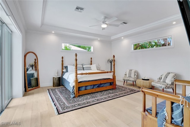 2120 Curtis St, Naples, FL 34112 - bedroom with a tray ceiling, wood finished floors, crown molding, recessed lighting, and ceiling fan