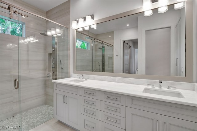 2120 Curtis St, Naples, FL 34112 - bathroom featuring double vanity and a shower stall