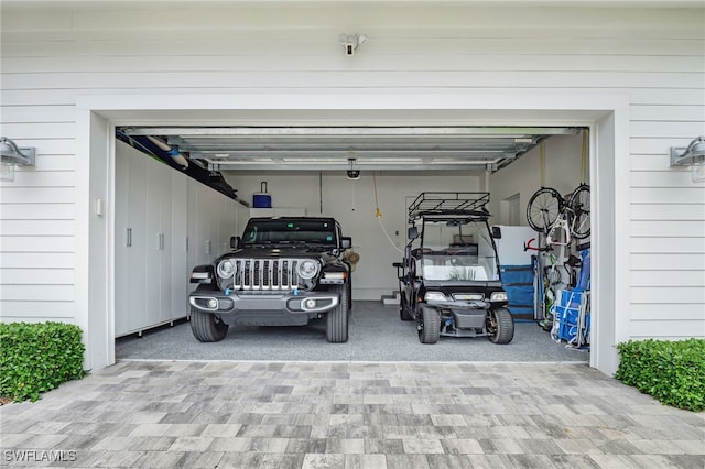 2120 Curtis St, Naples, FL 34112 - garage featuring driveway