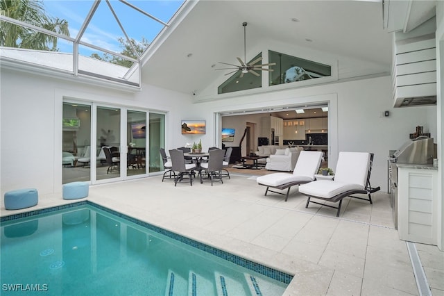 2120 Curtis St, Naples, FL 34112 - outdoor pool with ceiling fan, a patio area, and glass enclosure