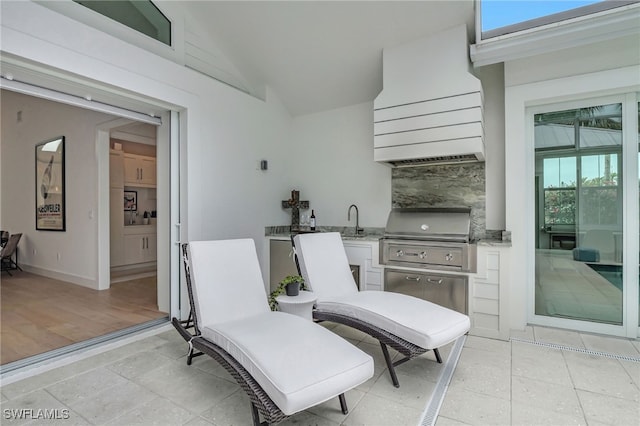 2120 Curtis St, Naples, FL 34112 - view of patio / terrace with an outdoor kitchen
