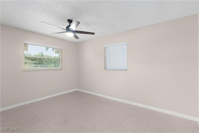 1141 S Alhambra Cir, Naples, FL 34103 - empty room with ceiling fan and a textured ceiling