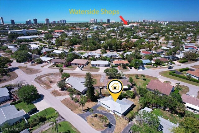 1141 S Alhambra Cir, Naples, FL 34103 - aerial view of property and surrounding area featuring city skyline