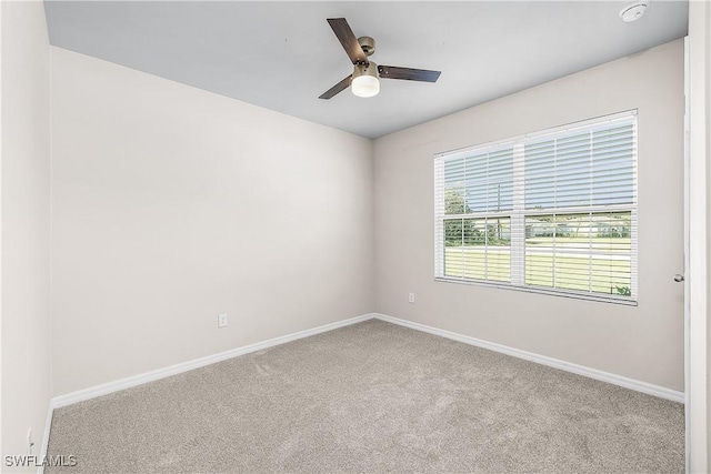 616 Posadas Cir, Punta Gorda, FL 33983 - carpeted empty room with ceiling fan and a smoke detector