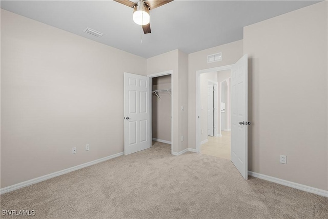 616 Posadas Cir, Punta Gorda, FL 33983 - unfurnished bedroom featuring light colored carpet, a closet, and a ceiling fan