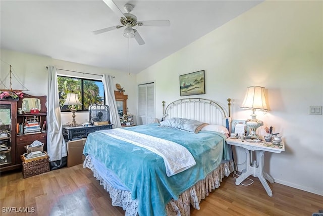 13532 Siesta Pines Ct Unit 5, Fort Myers, FL 33908 - bedroom with wood finished floors, a closet, and a ceiling fan