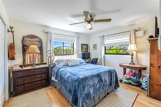 13532 Siesta Pines Ct Unit 5, Fort Myers, FL 33908 - bedroom featuring light wood finished floors and a ceiling fan