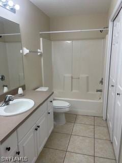 1568/1570 Gilbert Ave S, Lehigh Acres, FL 33973 - bathroom with vanity, tile patterned floors, and bathing tub / shower combination