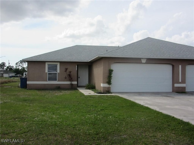1568/1570 Gilbert Ave S, Lehigh Acres, FL 33973 - view of front of property featuring a garage, stucco siding, roof with shingles, and driveway