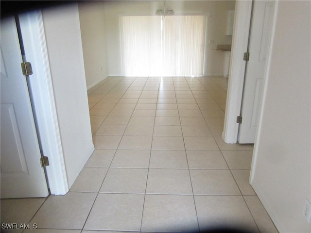 1568/1570 Gilbert Ave S, Lehigh Acres, FL 33973 - hallway featuring light tile patterned floors