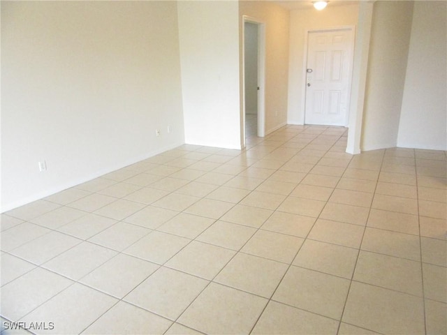 1568/1570 Gilbert Ave S, Lehigh Acres, FL 33973 - spare room featuring light tile patterned floors