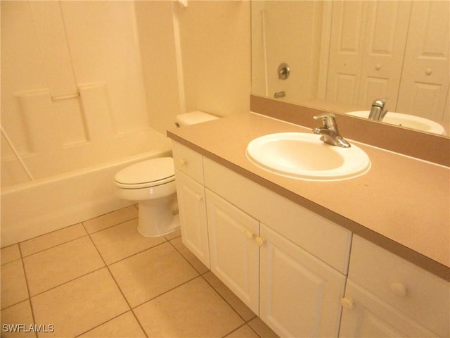 1568/1570 Gilbert Ave S, Lehigh Acres, FL 33973 - bathroom featuring tile patterned floors, vanity, and bathing tub / shower combination