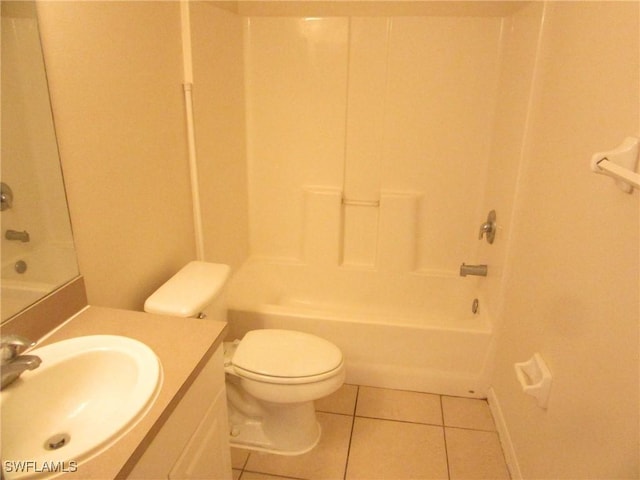 1568/1570 Gilbert Ave S, Lehigh Acres, FL 33973 - full bath with tile patterned floors, vanity, and tub / shower combination
