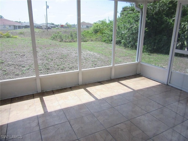 1568/1570 Gilbert Ave S, Lehigh Acres, FL 33973 - view of unfurnished sunroom