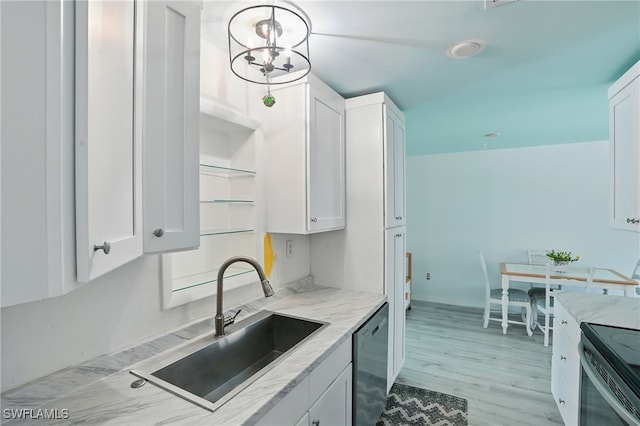 4011 Coconut Cir S, Naples, FL 34104 - kitchen featuring white cabinetry, stainless steel appliances, light stone counters, and light wood-style floors