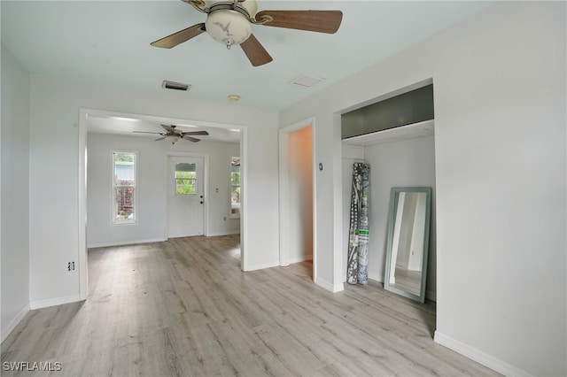 4011 Coconut Cir S, Naples, FL 34104 - spare room with ceiling fan and wood finished floors