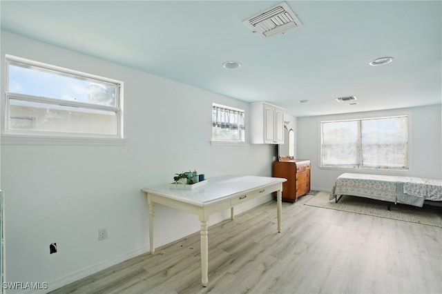 4011 Coconut Cir S, Naples, FL 34104 - bedroom with light wood finished floors and recessed lighting