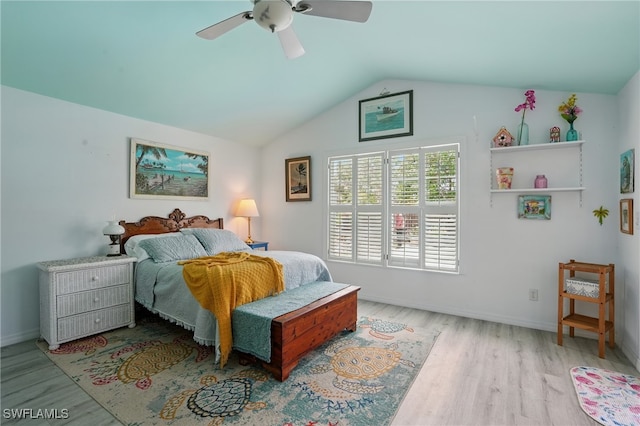 4011 Coconut Cir S, Naples, FL 34104 - bedroom with wood finished floors, lofted ceiling, and ceiling fan