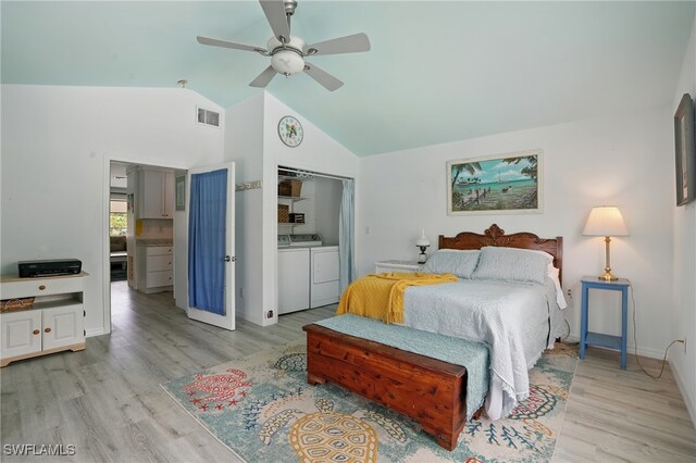 4011 Coconut Cir S, Naples, FL 34104 - bedroom with independent washer and dryer, light wood-type flooring, lofted ceiling, and a ceiling fan