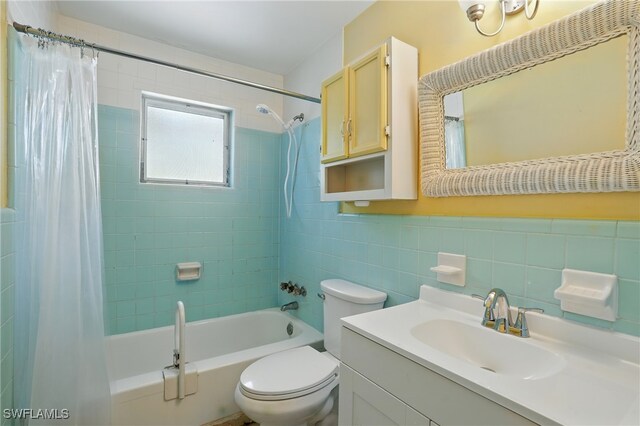 4011 Coconut Cir S, Naples, FL 34104 - full bath featuring shower / tub combo with curtain, vanity, and tile walls