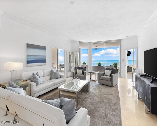 7117 Pelican Bay Blvd Unit 1903, Naples, FL 34108 - living room featuring crown molding, floor to ceiling windows, and light tile patterned flooring
