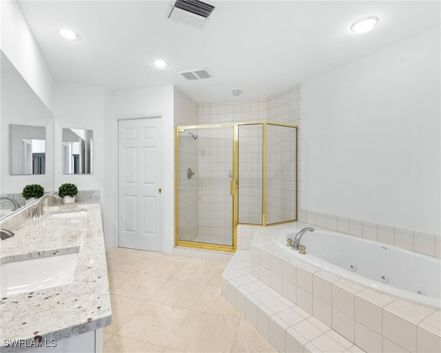 7117 Pelican Bay Blvd Unit 1903, Naples, FL 34108 - full bathroom with a whirlpool tub, a stall shower, double vanity, recessed lighting, and tile patterned flooring