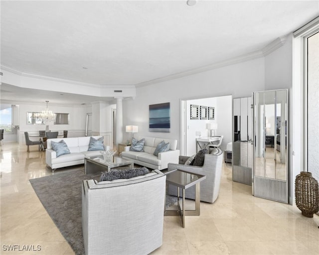 7117 Pelican Bay Blvd Unit 1903, Naples, FL 34108 - living room with crown molding, a chandelier, and ornate columns