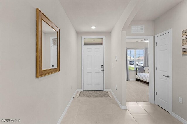 1700 SW 3rd St, Cape Coral, FL 33991 - foyer featuring light tile patterned flooring and recessed lighting