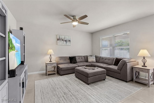 1700 SW 3rd St, Cape Coral, FL 33991 - living area with light tile patterned floors and ceiling fan