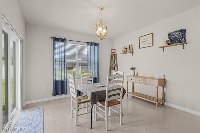 1700 SW 3rd St, Cape Coral, FL 33991 - dining space featuring a chandelier, plenty of natural light, and light tile patterned floors