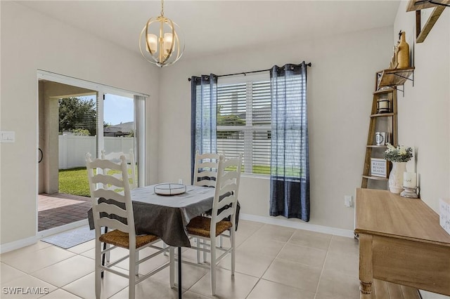 1700 SW 3rd St, Cape Coral, FL 33991 - dining space with a chandelier and light tile patterned flooring