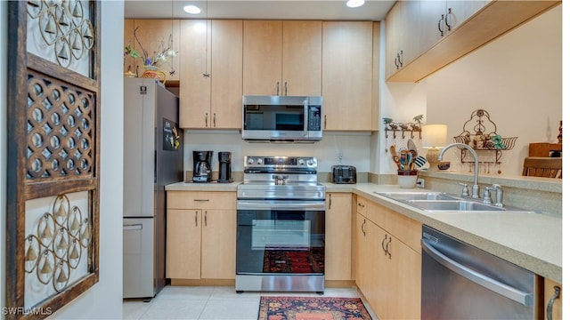 1133 Van Loon Commons Cir Unit 202, Cape Coral, FL 33909 - kitchen with stainless steel appliances, light brown cabinets, light countertops, recessed lighting, and light tile patterned floors